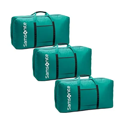Samsonite turquoise duffel bag with two-tone handles, shown in a travel setting.