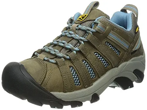 KEEN women's Voyageur low hiking shoes on a dirt trail