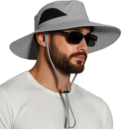 EINSKEY wide brim bucket hat in khaki with mesh panels and chin strap.