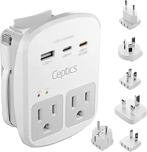White Ceptics universal travel adapter with multiple plug attachments and a USB cable