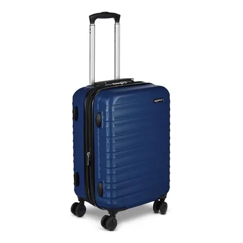 Amazon Basics navy blue hardside carry-on luggage with spinner wheels