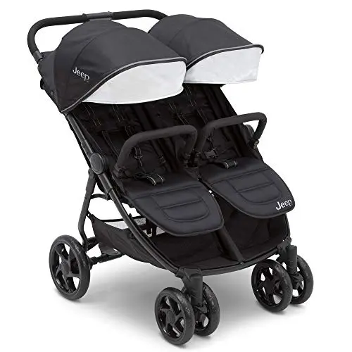 Jeep Destination Ultralight side-by-side double stroller in black on a path