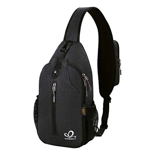 Black WATERFLY sling backpack laid flat, showing front and strap pockets.