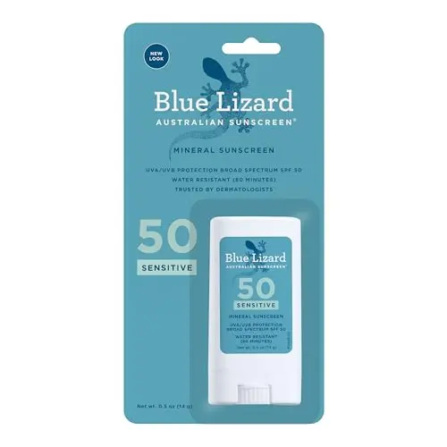 Blue Lizard Sensitive Mineral Sunscreen Stick held against a blue sky