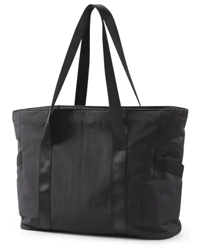 BAGSMART women's tote bag with zipper and compartments open on a table.