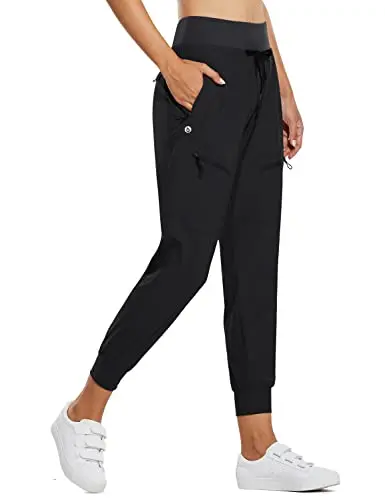 BALEAF Women's Lightweight Jogger Pants with high waist and zipper pockets.