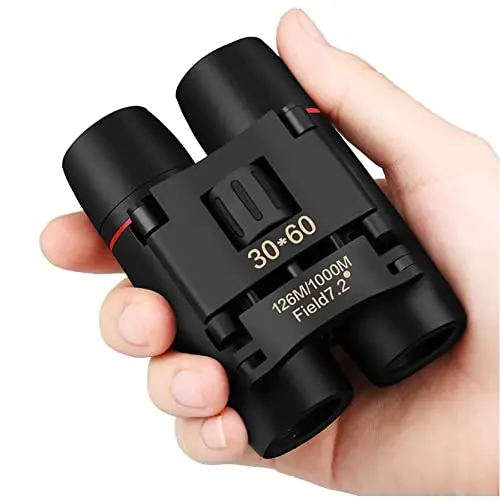 ZIYOUHU foldable compact binoculars, shown in a small carrying pouch, emphasizing their ultra-portable nature.