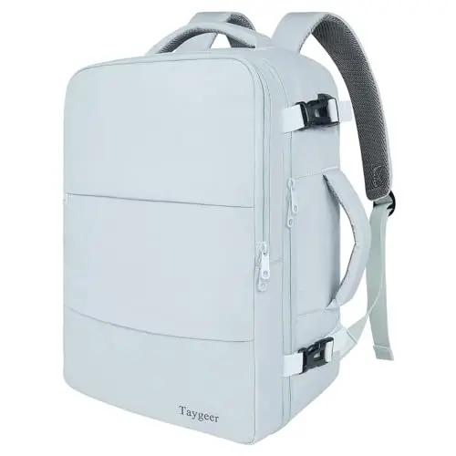 Taygeer 35L blue travel backpack open, showing multiple compartments and a built-in USB port.