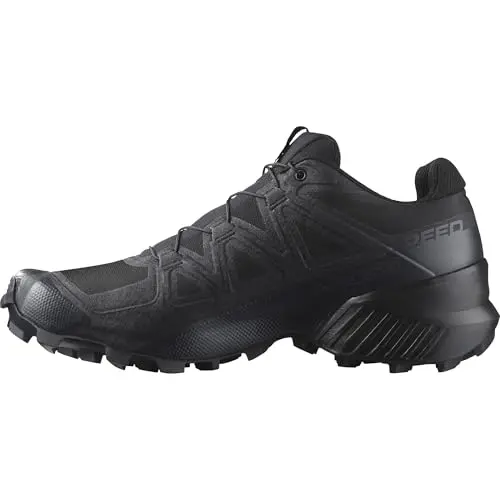 Salomon Speedcross trail running shoe on muddy terrain