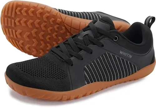 WHITIN men's extra wide barefoot minimalist shoes on a rocky trail