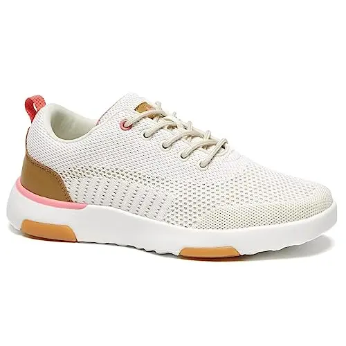 Women's beige orthopedic walking sneakers with arch support, featuring a lace-up design and durable sole.