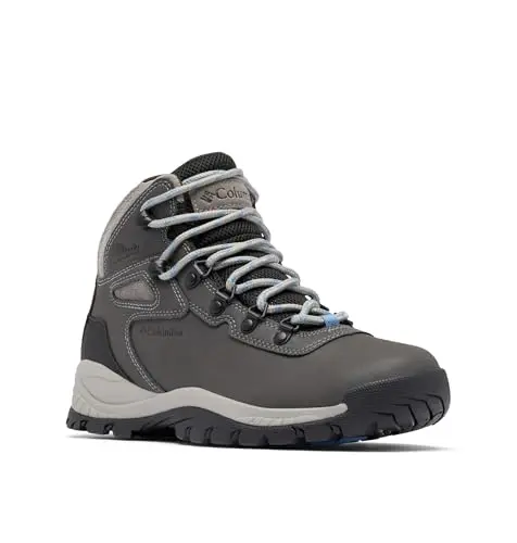 Columbia women's Newton Ridge waterproof hiking boots on a forest trail