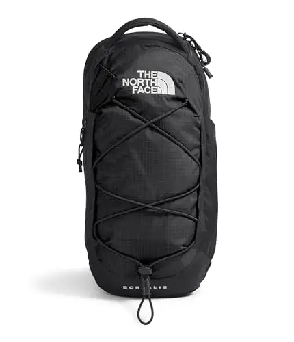 THE NORTH FACE Borealis sling bag in black, showing its iconic bungee cord system.