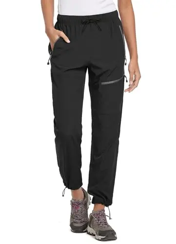 BALEAF Travel Pants for Women showing lightweight, water-resistant fabric and zippered pockets.