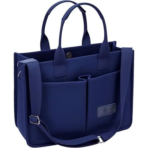 ZHMO canvas tote bag standing upright on a wooden floor.