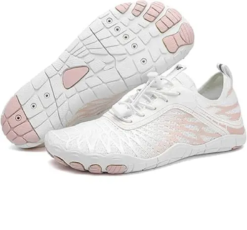 Hike Footwear HF barefoot shoes in white and pink on a wooden deck