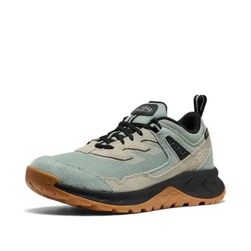 KEEN Hightrail Low waterproof hiking shoe on green and stone terrain