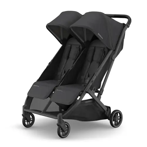 UPPAbaby Minu Duo double stroller in charcoal, folded compactly standing upright