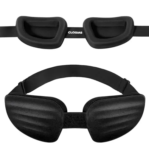 Black hydrating sleep mask with memory foam cups and adjustable strap.