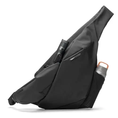 NIID R2 modular sling bag in black, showing external attachment points and sleek profile